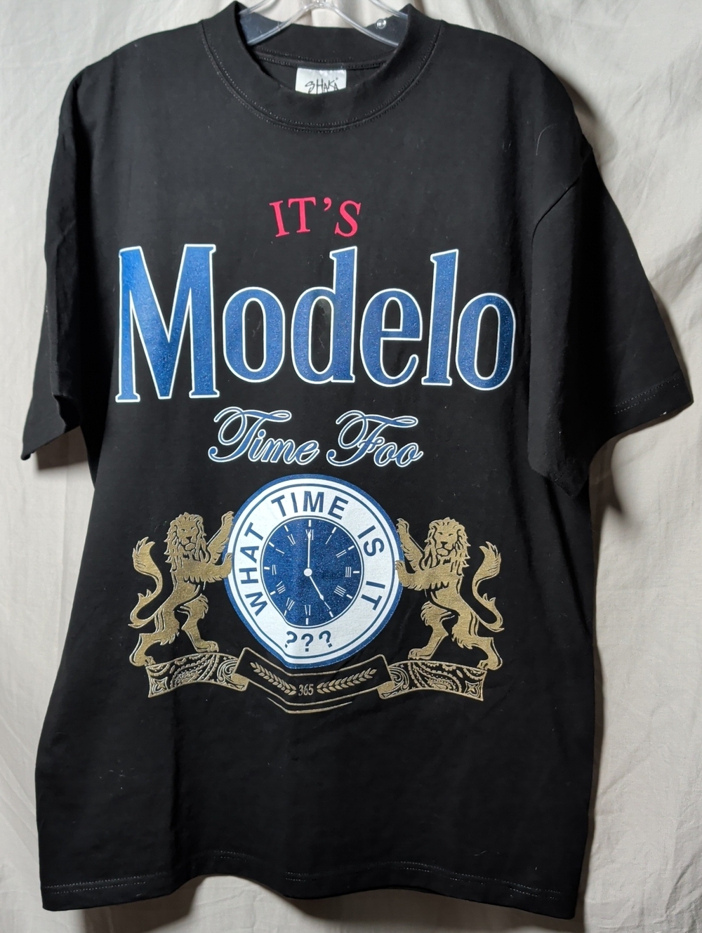 Modelo Black Graphic Tee with Blue, Gold and Red Accents Casual Event Wear